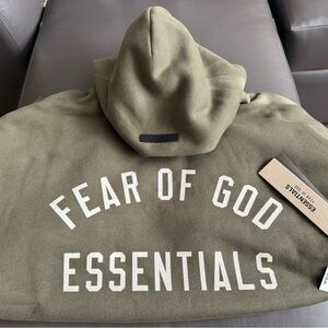 Selling this brand new fear of god essentials sweatshirt.